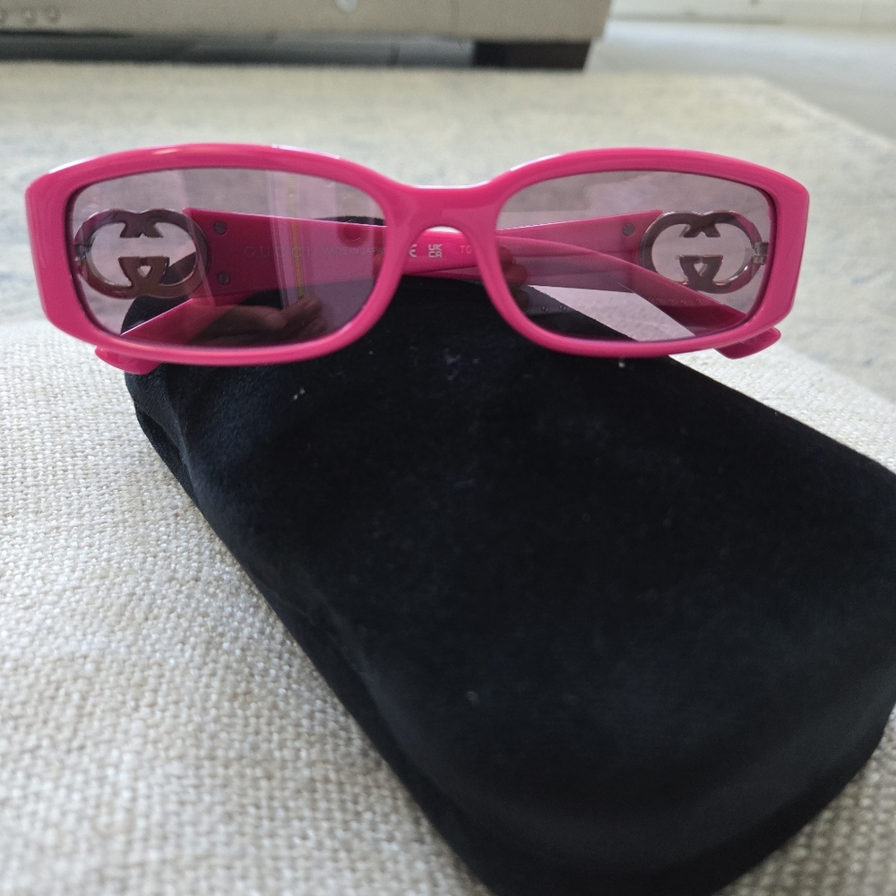 Vibrant Pink Modern Sunglasses with UV Protection.  Gucci 54mm Cat Eye Sunglass